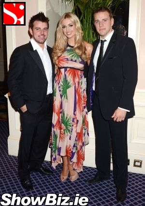 http://www.showbiz.ie/photos/2011-07-andy-quirke--rosanna-davison--wesley-quirke.jpg